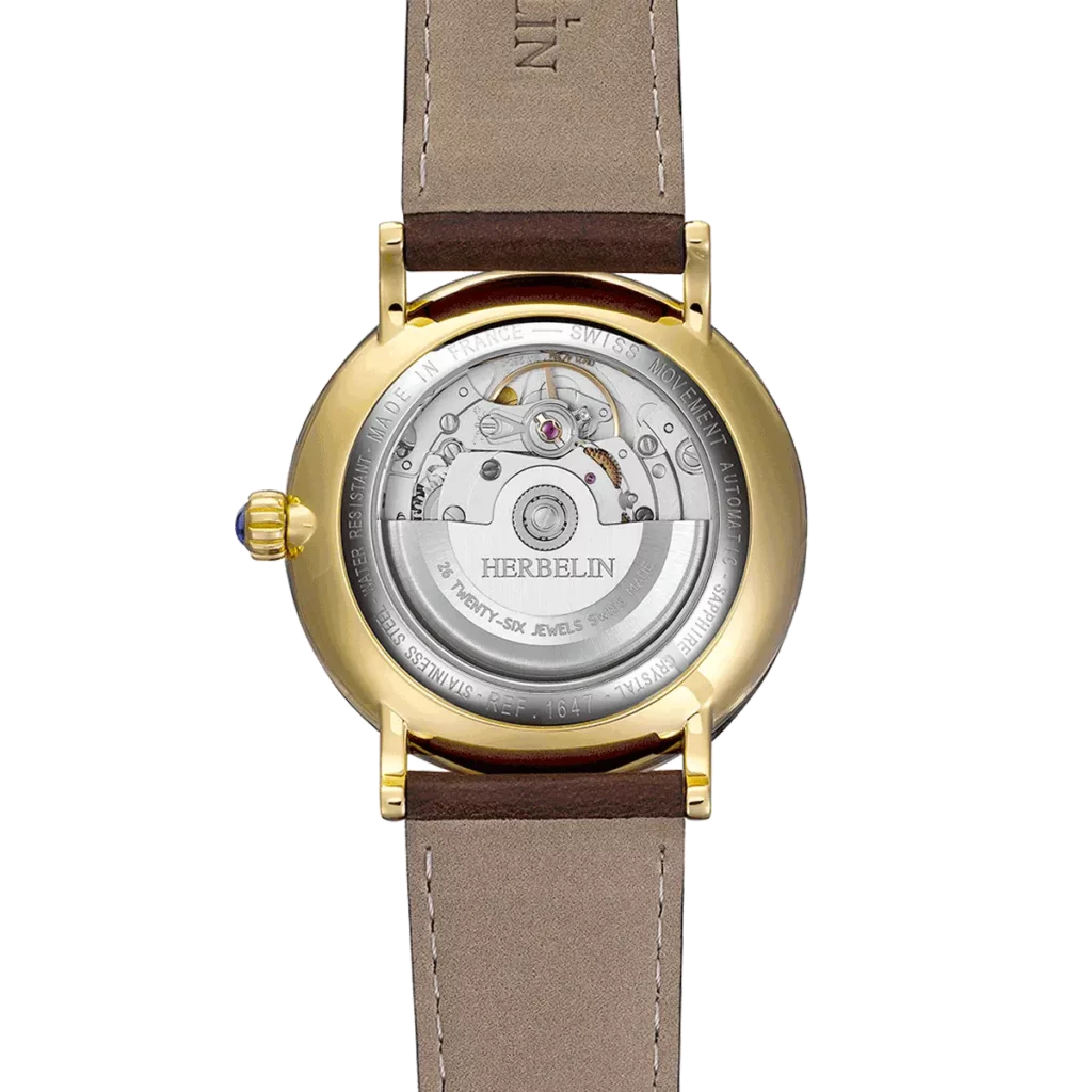 dos montre herbelin plaque or jaune mouvement automatique cadran vert