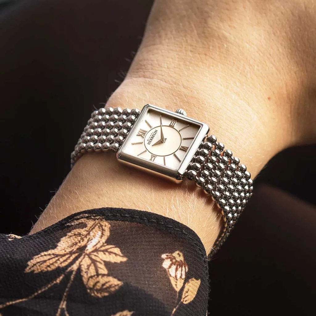 montre herbelin femme perles cadran nacre argent